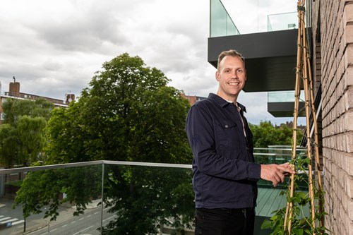 Ryan on his balcony