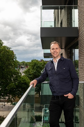 Ryan on his balcony at Heron Quarter